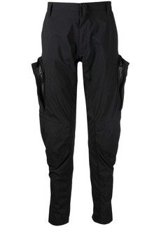 Acronym articulated cargo-pocket trousers
