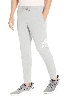 adidas mens Essentials French Terry Cuffed Logo Track Pants   US