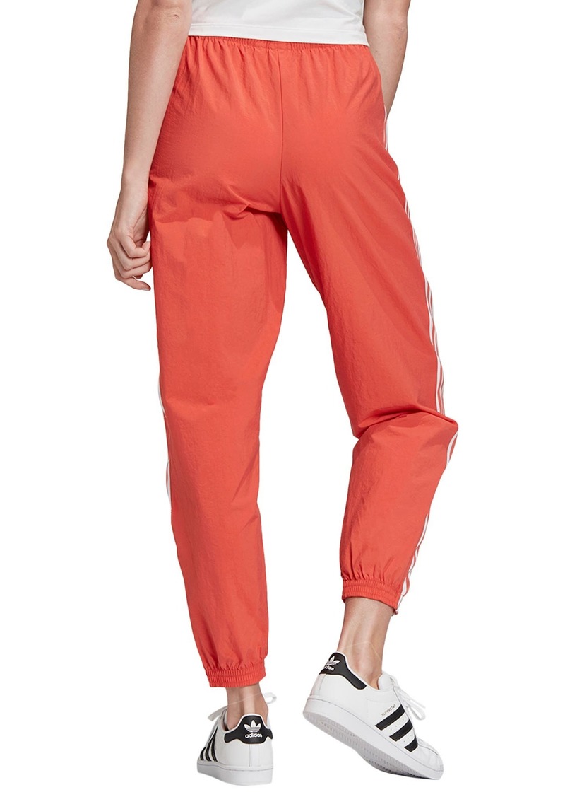 adidas originals adicolor locked up logo track pants in red