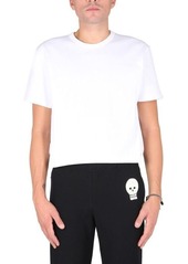 ALEXANDER MCQUEEN T-SHIRT WITH GRAFFITI LOGO PRINT