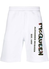 Alexander McQueen Graffiti-print cotton track shorts