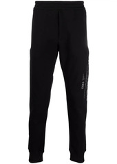 Alexander McQueen logo-print cotton track trousers