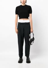 Alexander Wang logo-embossed cropped knitted top