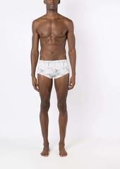 AMIR graphic-print swim trunks