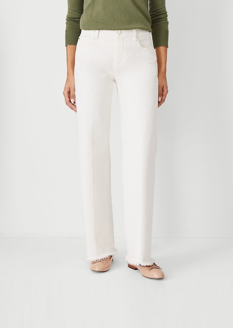 Ann Taylor Petite Frayed Mid Rise Wide Leg Jeans in Ivory