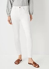 Ann Taylor Petite Sculpting Pocket Mid Rise Skinny Jeans in White