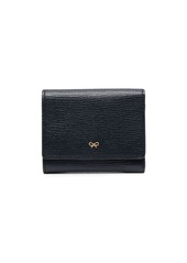 Anya Hindmarch face-motif faux-leather wallet
