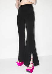 Area nameplate flared leg trousers