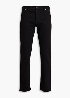 Balmain - Slim-fit studded denim jeans - Black - 31