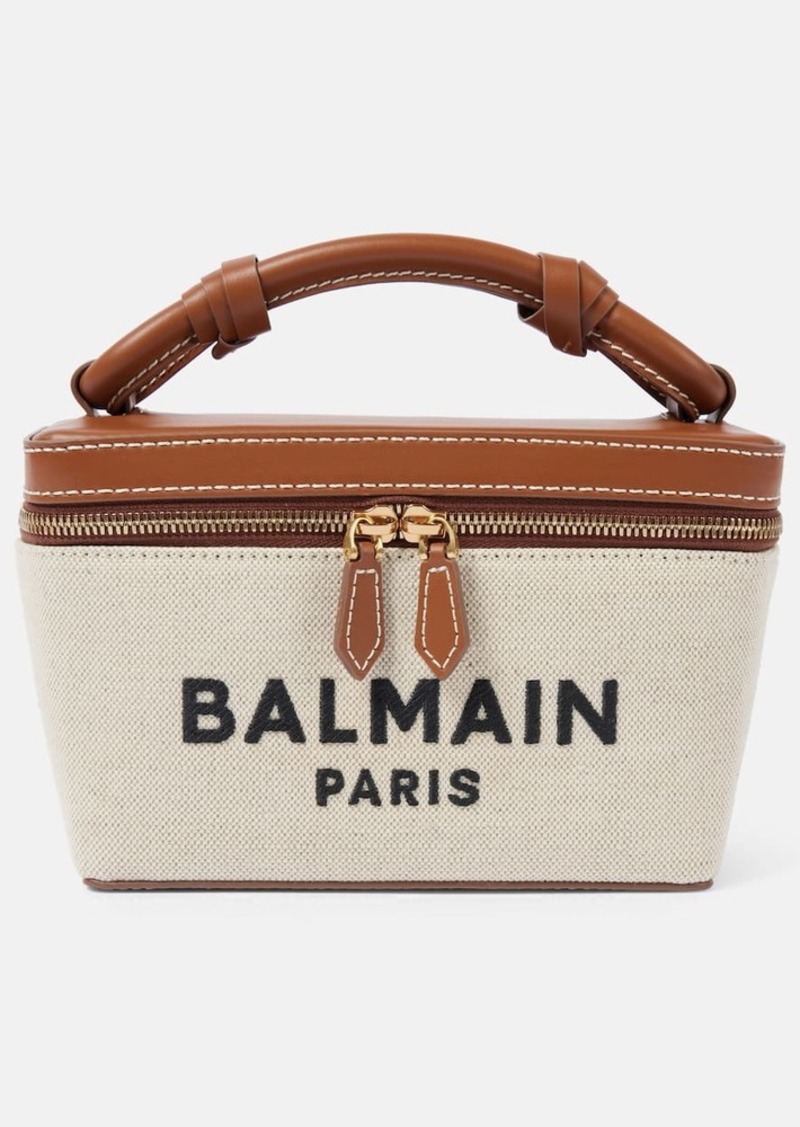 Balmain B-Army leather-trimmed canvas makeup bag