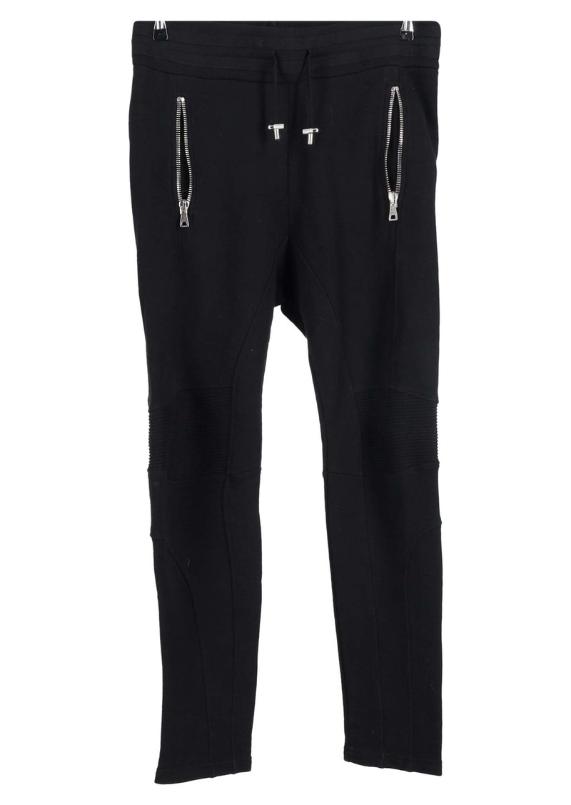 Balmain Embossed Logo Track Pants in Black Cotton