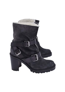 Christian Louboutin Buckle Strap Shearling-Lined Boots in Black Suede