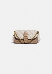 Coach beat crossbody clutch in signature canvas with...