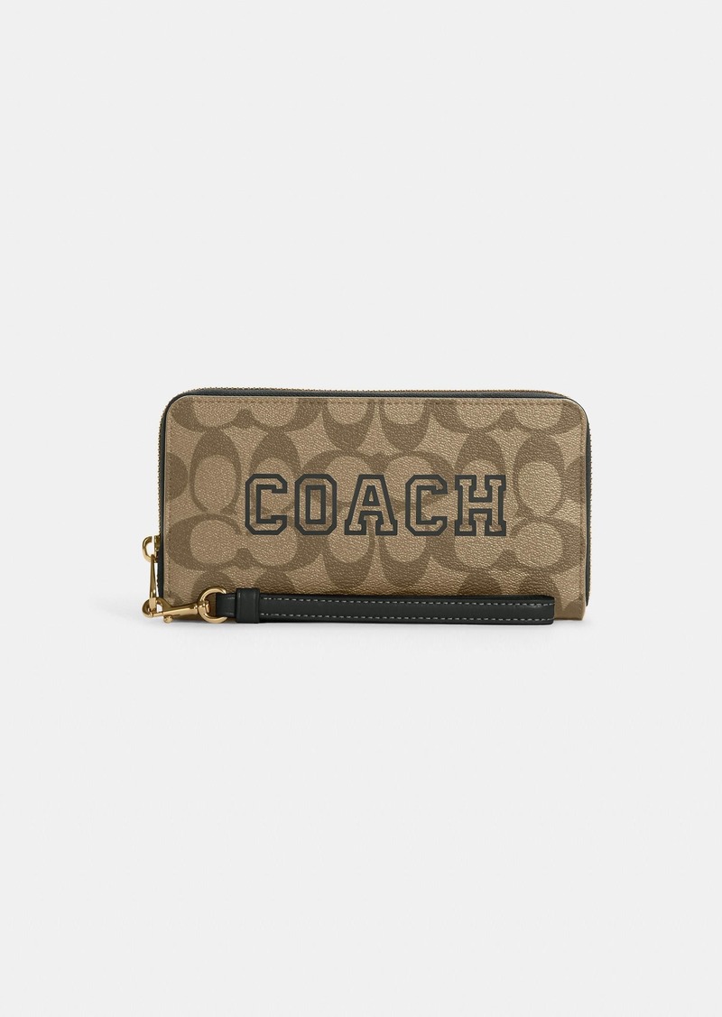 Long Zip Around Wallet In Signature Canvas With Varsity Motif