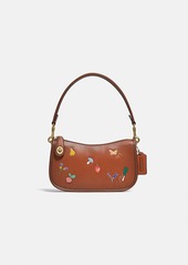 Coach swinger bag with garden embroidery