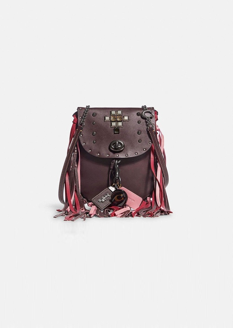 fringe saddle bag with pyramid rivets