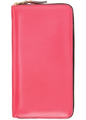 COMME des GARÇONS WALLETS Pink Super Fluo Zip Wallet