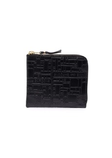 Comme des Garçons Embossed Logotype small zip leather wallet