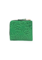 Comme des Garçons embossed zip-up wallet