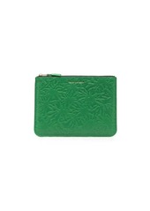 Comme des Garçons embossed zip-up wallet