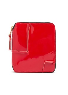 Comme des Garçons Reversed Hem Patent Zip Around Wallet