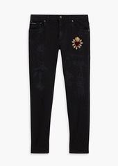 Dolce & Gabbana - Skinny-fit appliquéd distressed denim jeans - Black - IT 50