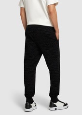 Dolce & Gabbana Flocked Logo Cotton Jersey Sweatpants