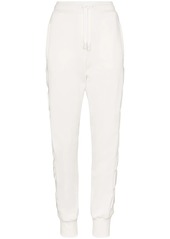 Dolce & Gabbana logo-embossed cotton track pants