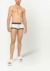 Dolce & Gabbana logo-patch high-leg swim shorts
