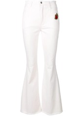 Dolce & Gabbana Sacred Heart patch flared jeans