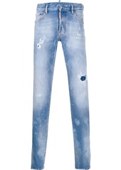 Dsquared2 distressed effect logo patch jeans
