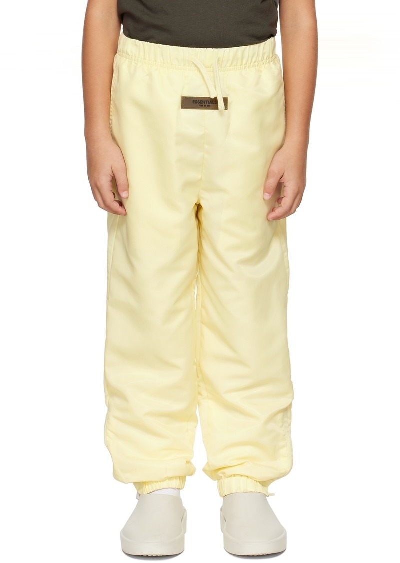 Fear of God ESSENTIALS Kids Yellow Nylon Track Pants