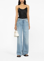 FRAME wide-leg washed denim trousers