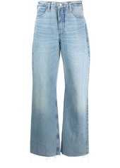 FRAME wide-leg washed denim trousers