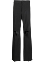 GIVENCHY Ripped wool trousers