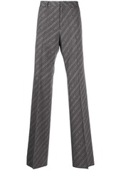 Givenchy logo diagonal striped trousers