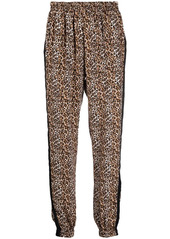 Gold Hawk leopard print trousers