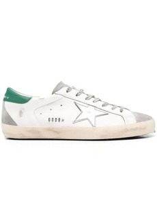 GOLDEN GOOSE SUPER-STAR LEATHER UPPER AND HEEL SUEDE TOE AND SPUR LAMINATED STAR METAL LETTERING SHOES