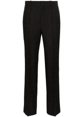Gucci GG-embroidered wool and silk-blend slim-fit trousers