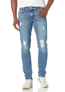 GUESS mens Distressed Slim Fit Tapered Leg Jeans   US