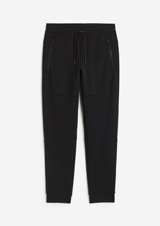 H&M H & M - DryMove Tapered Tech Joggers with Zipper Pockets - Black