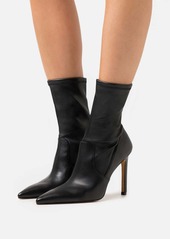 IRO Asper Leather Ankle Boots In Black