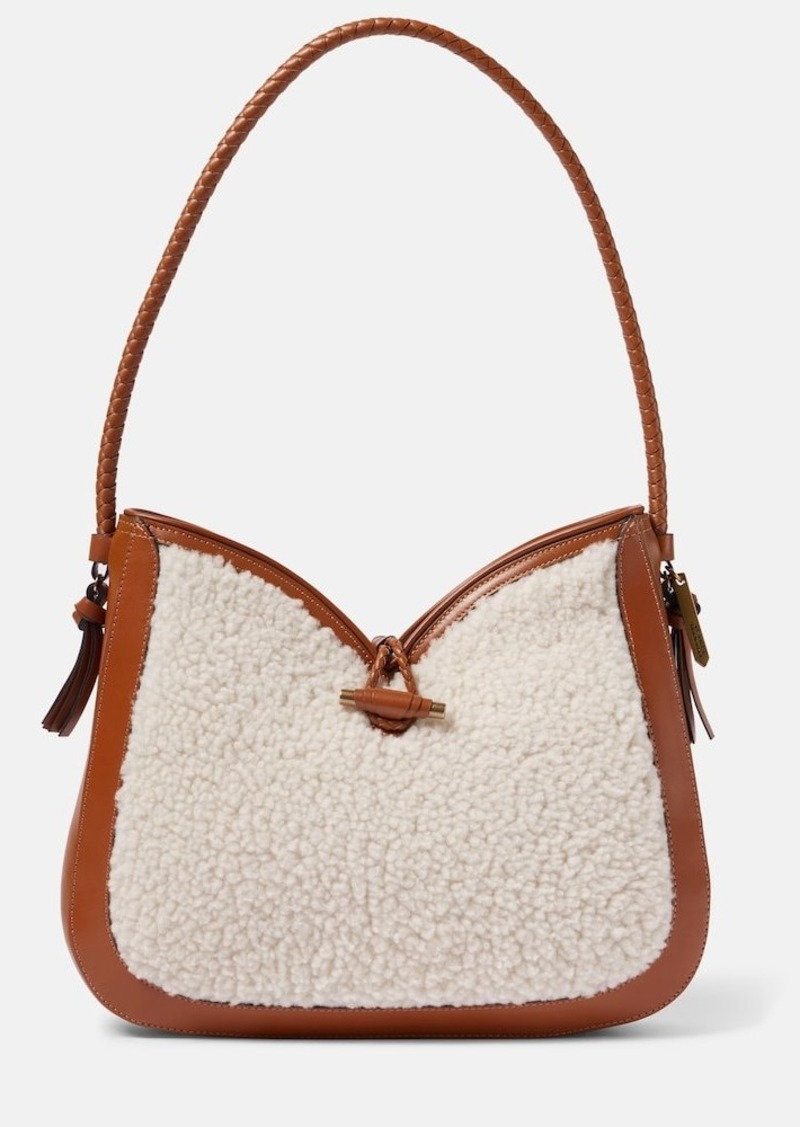 Isabel Marant Vigo Medium shearling and leather shoulder bag