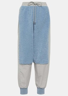 JW Anderson Paneled faux shearling sweatpants