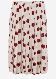 KHAITE PLEATED SKIRT WITH GRAPHIC PRINT