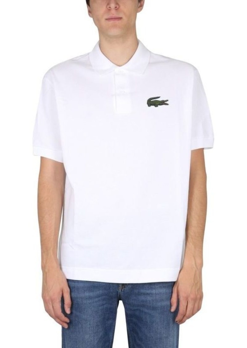 LACOSTE LOOSE FIT POLO.