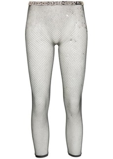 MAISON MARGIELA rhinestone-embellished mesh leggings