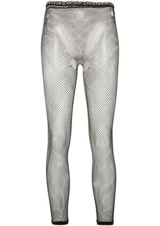 MAISON MARGIELA rhinestone-embellished mesh leggings