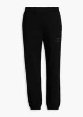McQ Alexander McQueen - Appliquéd French cotton-terry sweatpants - Black - XXS