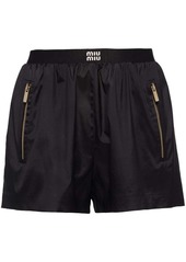 Miu Miu logo waistband track shorts